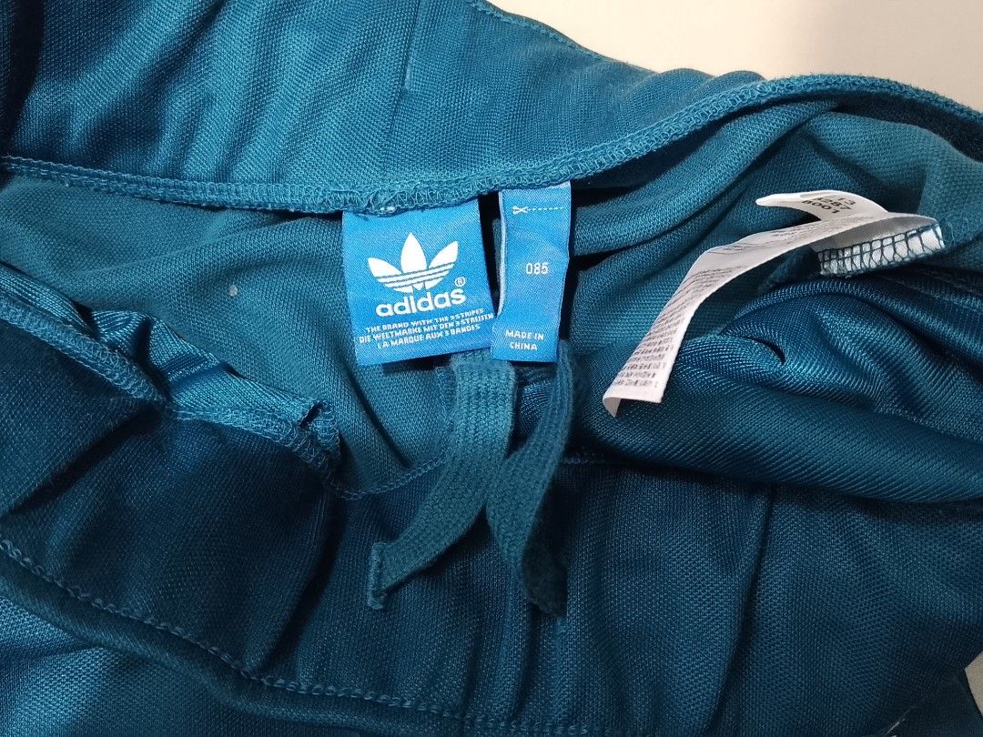 Adidas original track pants size 27/28 m (Category: Activewear) located in Cavite. Submitted by authentickids_wear (Listing ID 1452653027, Image 2). Description: Adidas original track pants size 27/28.
