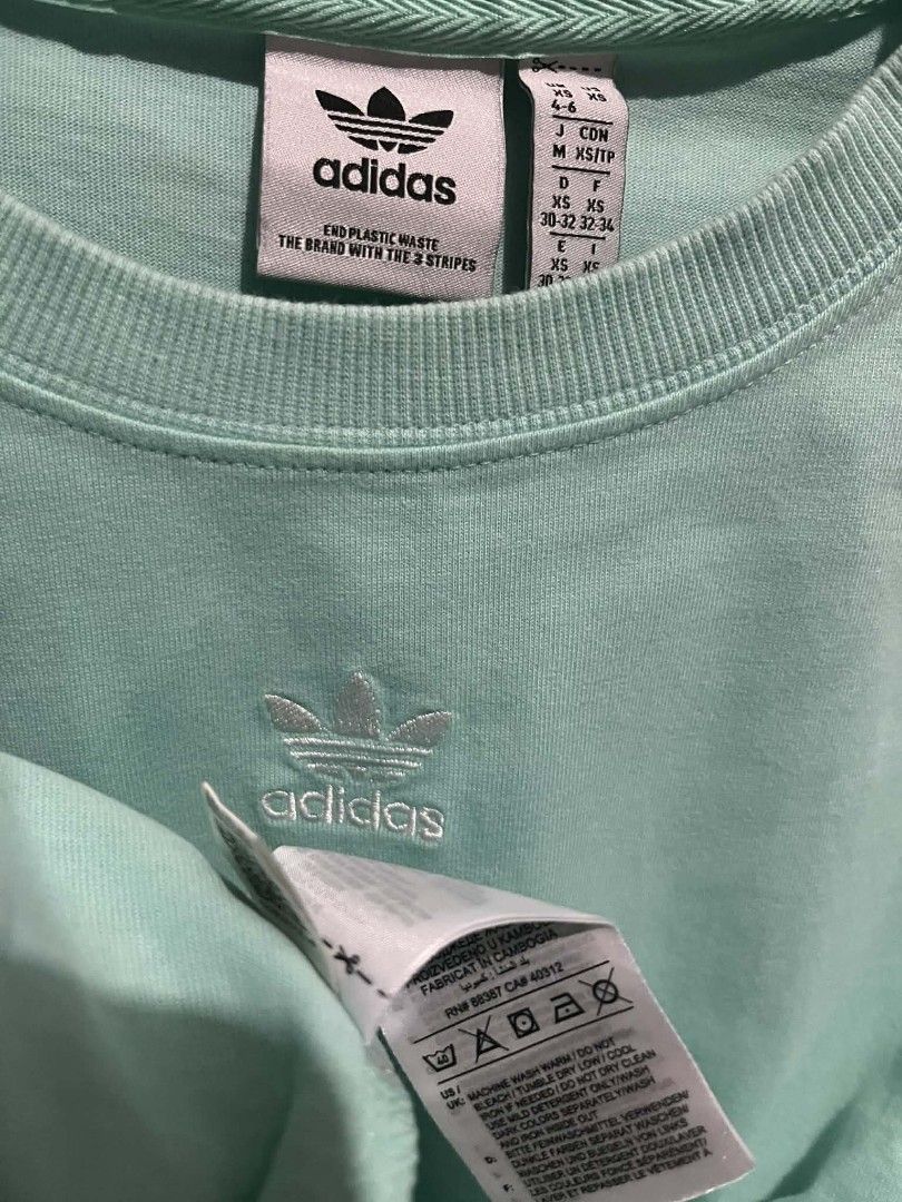 Adidas Mid Logo Trefoil Shirt (Category: Tshirts & Polo Shirts ) located in Munoz. Submitted by mrkcl_ (Listing ID 1452613348, Image 2). Description: Small oversized Fits up to Large XL No issue Excellent to like new.