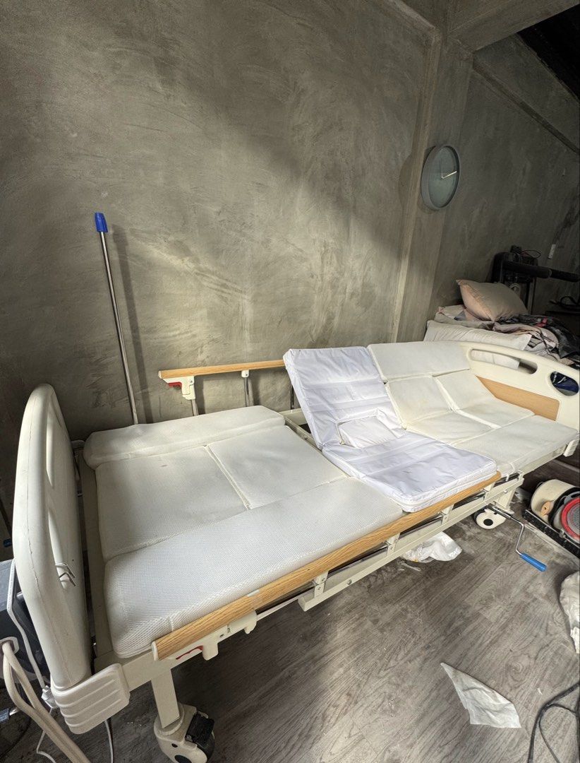 Adjustable hospital bed with air matress (Category: Medical Supplies & Tools) located in Manila. Submitted by chai.1018 (Listing ID 1452584182, Image 3). Description: - hospital bed for home care or recovery - Adjustable backrest and leg rest for customized comfort - Easy-to-raise and lower side rails for safety - Built-in wheels for effortless mobility - Comes with a comfortable mattress - Feel free to ask any questions! FOR PICK UP ONLY. Locati