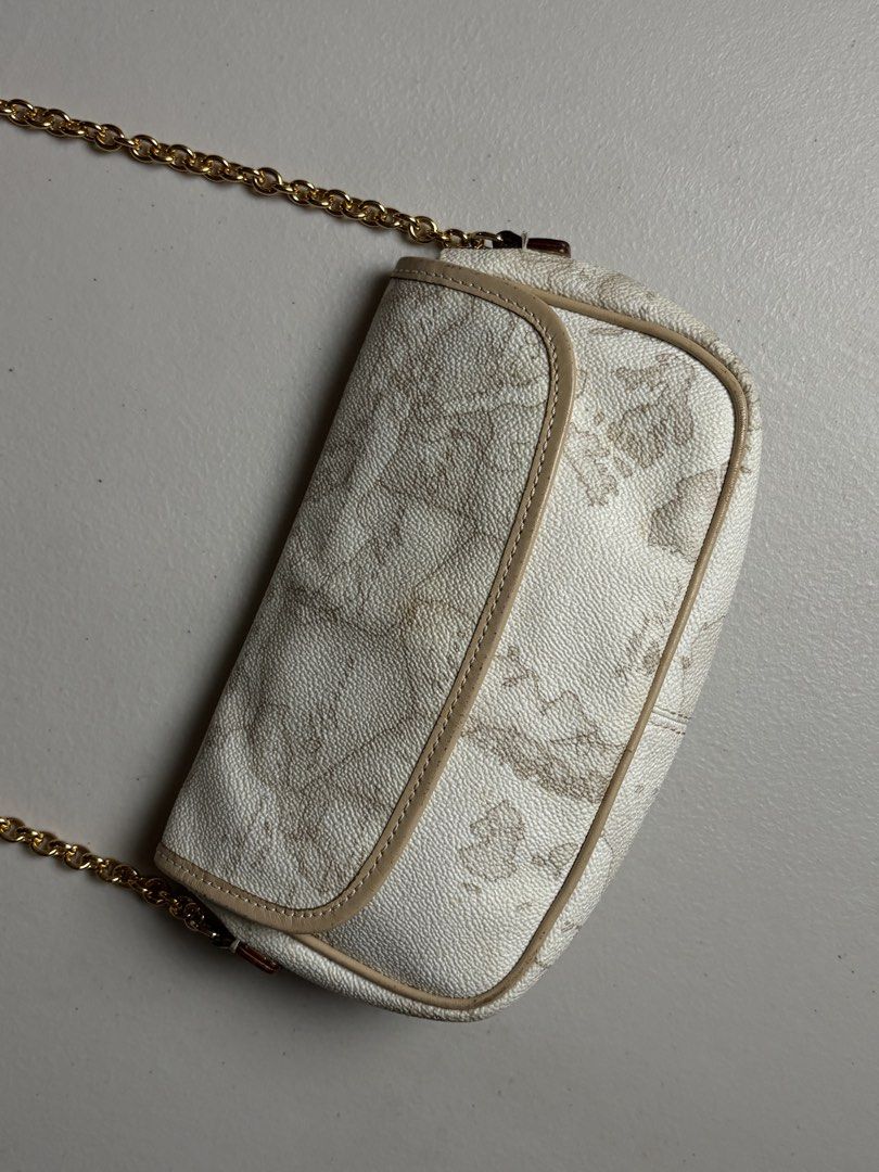 Alviero Martini White Map Canvas - small chain sling bag (Category: Cross-body Bags) located in Manila. Submitted by hippiesph (Listing ID 1452675515, Image 2). Description: Alviero Martini White Map Canvas - small chain sling bag Authentic Like new condition Price: 2,500 + sf.
