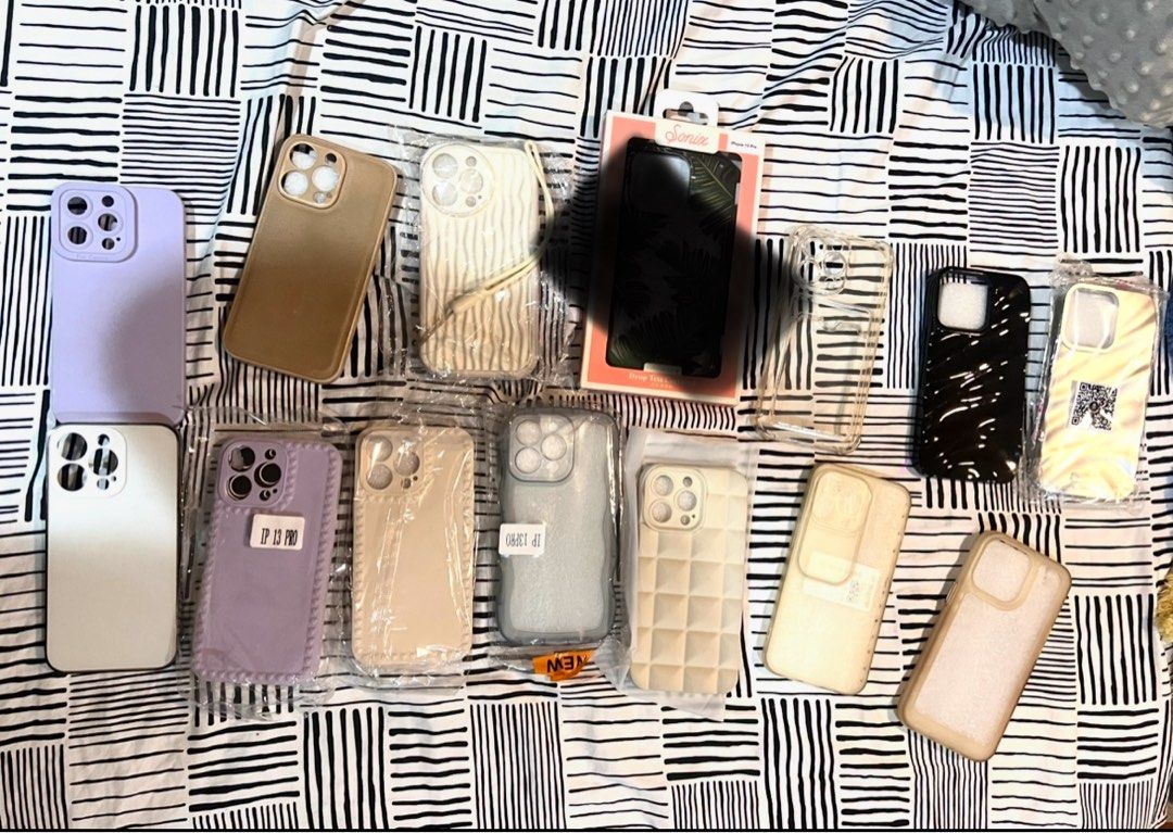 Apple iPhone 13 Pro phone mobile case (Category: Cases & Sleeves) located in Quezon City. Submitted by pasabuyshopmnl (Listing ID 1452639651, Image 1). Description: Mix of brand new and used Selling per piece or take all 50 (13 pcs) I can send close-up and actual photos for proof.