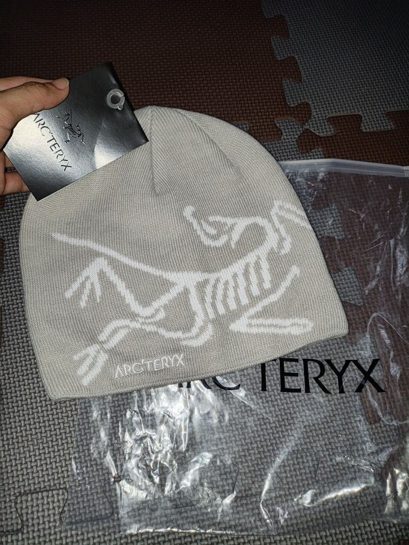 Arc'teryx Beanie Hat - Grey with White Logo (Category: Caps & Hats) located in Manila. Submitted by ererane19 (Listing ID 1452604994, Image 2). Description: - Authentic Arc'teryx beanie - Color: Light Grey - Iconic white logo design - Includes original packaging and tags - Ideal for keeping warm.