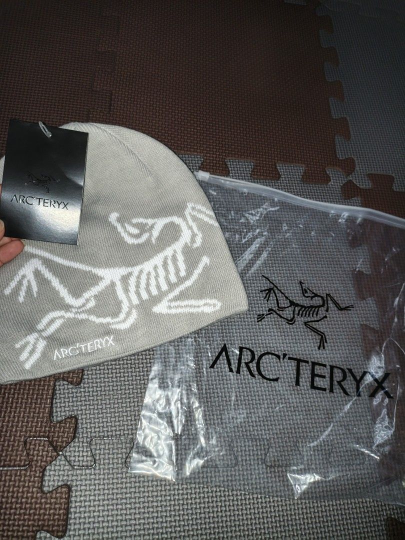 Arc'teryx Beanie Hat - Grey with White Logo (Category: Caps & Hats) located in Manila. Submitted by ererane19 (Listing ID 1452604994, Image 1). Description: - Authentic Arc'teryx beanie - Color: Light Grey - Iconic white logo design - Includes original packaging and tags - Ideal for keeping warm.