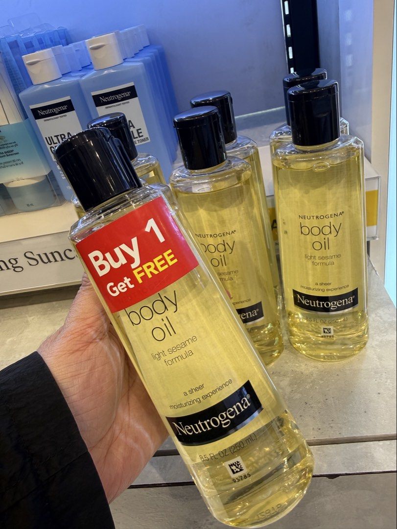 B1T1 Neutrogena Body Oil (Category: Body Care) located in Paranaque City. Submitted by ceciliascollection (Listing ID 1452637720, Image 2). Description: Neutrogena Body Oil Light Sesame This is Neutrogena Body Oil Light Sesame Formula, a sheer moisturizing oil designed to vanish into shower-damp skin. • The product is available in a 250 ML (8.5 FL OZ) bottle and features a light sesame formula that glides on easily to moisturize dry skin. • It is