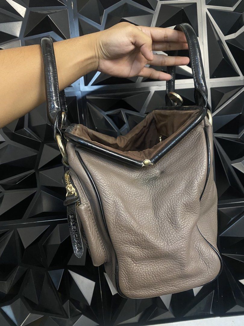 Balenciaga "Cabas" Frame Doctor Bag (Category: Luxury Bags & Wallets) located in Bulacan. Submitted by balenciaga_apparel01 (Listing ID 1452659265, Image 3). Description: This item is the Balenciaga “Cabas” Frame Doctor Bag from the mid-2000s Nicolas Ghesquière era - PRECISELY IN GOOD CONDITION - RANK A - BADLY NEED WASH INSIDE BUT OUTSIDE THE LEATHER IS GOOD - SIGN OF USAGE ONLY.