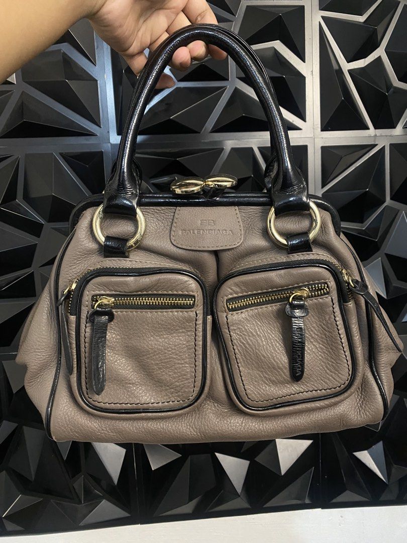 Balenciaga "Cabas" Frame Doctor Bag (Category: Luxury Bags & Wallets) located in Bulacan. Submitted by balenciaga_apparel01 (Listing ID 1452659265, Image 1). Description: This item is the Balenciaga “Cabas” Frame Doctor Bag from the mid-2000s Nicolas Ghesquière era - PRECISELY IN GOOD CONDITION - RANK A - BADLY NEED WASH INSIDE BUT OUTSIDE THE LEATHER IS GOOD - SIGN OF USAGE ONLY.