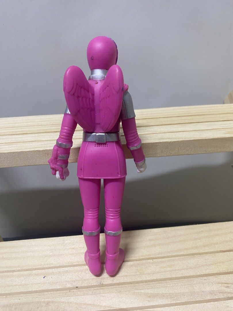 Bandai 2010 Pink Ranger Action Figure (Category: Figurines & Statues) located in Pasacao. Submitted by wengpullar37205 (Listing ID 1452676648, Image 2). Description: - Bandai Pink Ranger Action Figure - Approximately 6 inches tall - Features detachable wings on the back - Made in China - Perfect for Power Rangers fans and collectors.