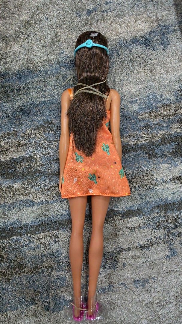 Barbie Doll Bed with Accessories and Doll (Category: Kids Toys) located in Manila. Submitted by chikawa3 (Listing ID 1452585685, Image 3). Description: - Barbie doll included, wearing a cute orange dress and eye mask. - Features a bed with fun pineapple print bedding. - Comes with a small dog figure. - Includes a side table with accessories. - Also includes pink slippers and a small plant. - Ideal for imaginative and creative play..