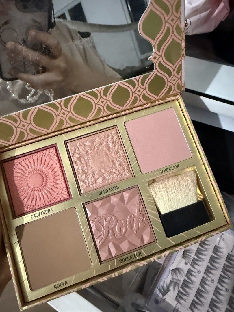 Benefit Cosmetics Blush Bar Palette (Category: Makeup) located in Manila. Submitted by aneajmik (Listing ID 1452559562, Image 2). Description: - Benefit Cosmetics Blush Bar palette - Includes 5 popular shades: Hoola bronzer, California blush, Gold Rush blush, Rockateur blush, and Dandelion blush. - Comes with a handy brush for application. - Ideal for contouring and adding a beautiful flush to your cheeks. - All shades are clearly visible in the 