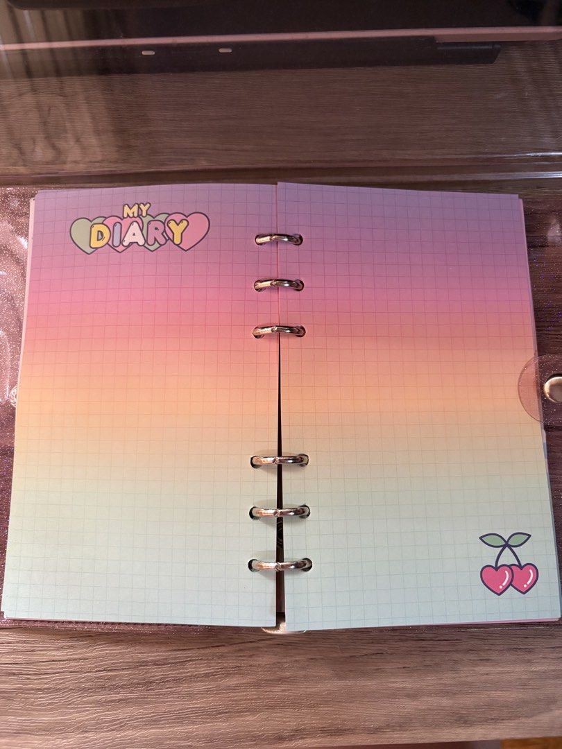 Bentoy Milkjoy A6 Binder Diary / Planner / Notebook (Category: Stationery & School Supplies) located in Quezon City. Submitted by softibloom (Listing ID 1452518101, Image 3). Description: 💲 Price: ₱400 + Shipping 👉 Shipping is shouldered by the buyer ✏️ Product Notes: — Brand: Bentoy Milkjoy — Hand me down from my sibling, still usable. — Comes with various page designs, see pics for details. 🎒Condition: Like New: — Used a few 1-2 pages ❓RFS: 