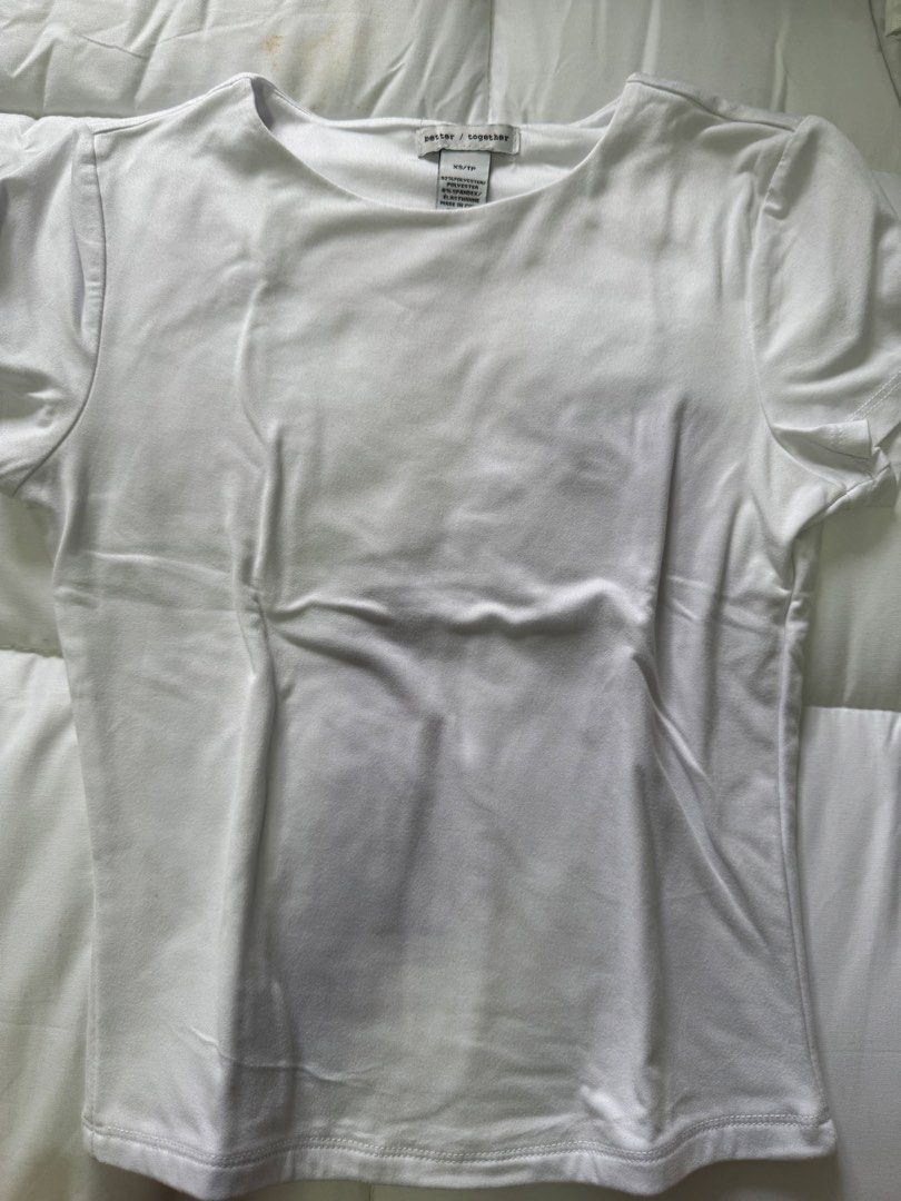 Better / Together White Basic T-Shirt XS/TP (Category: Shirts) located in Manila. Submitted by decluterthings888 (Listing ID 1452611397, Image 1). Description: - Brand: Better / Together - Color: White - Sleeve Length: Short Sleeve - Material: Polyester and Elastane blend - Features: Comfortable, stretchy fabric - Style: Basic, simple, clean design - Versatility: Easy to pair with jeans or skirts.
