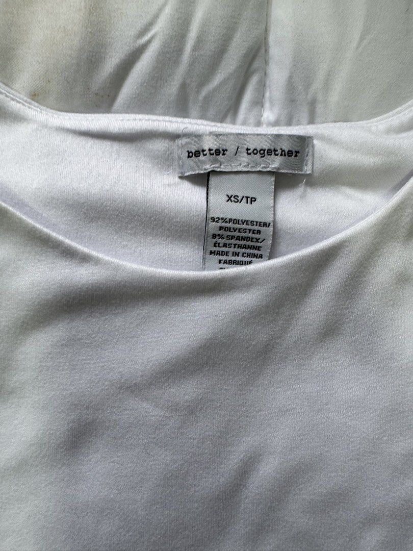 Better / Together White Basic T-Shirt XS/TP (Category: Shirts) located in Manila. Submitted by decluterthings888 (Listing ID 1452611397, Image 2). Description: - Brand: Better / Together - Color: White - Sleeve Length: Short Sleeve - Material: Polyester and Elastane blend - Features: Comfortable, stretchy fabric - Style: Basic, simple, clean design - Versatility: Easy to pair with jeans or skirts.