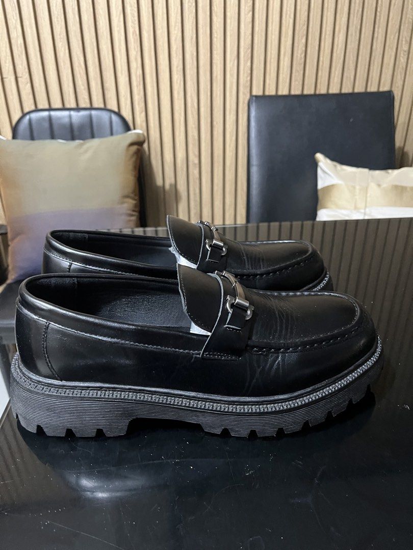 Black Chunky Sole Loafers with Silver Buckle (Category: Dress Shoes) located in Imus. Submitted by jappanergo (Listing ID 1452633589, Image 3). Description: - Classic black leather loafers - Chunky lug sole for a modern look - Elegant silver metal buckle detail - Easy slip-on style - Versatile: dress up or down Wore once for wedding.