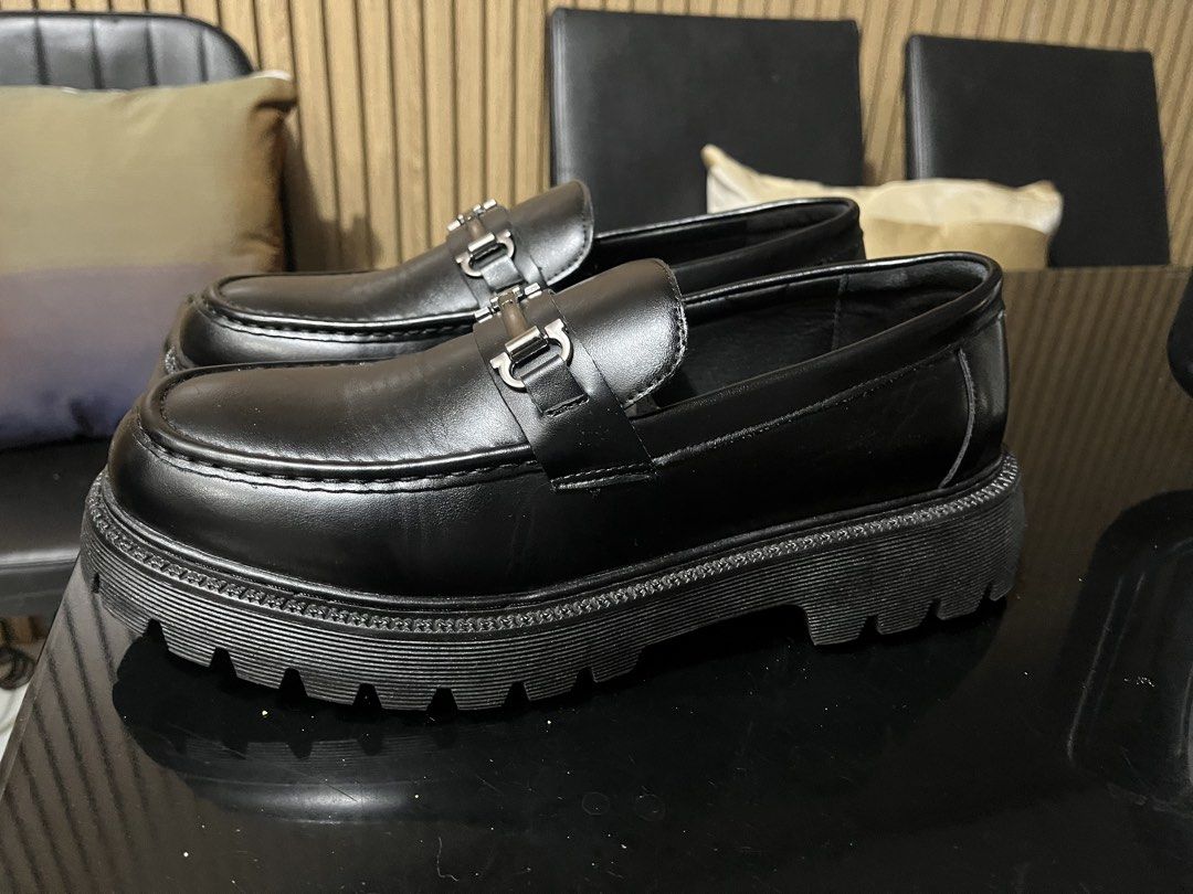 Black Chunky Sole Loafers with Silver Buckle (Category: Dress Shoes) located in Imus. Submitted by jappanergo (Listing ID 1452633589, Image 1). Description: - Classic black leather loafers - Chunky lug sole for a modern look - Elegant silver metal buckle detail - Easy slip-on style - Versatile: dress up or down Wore once for wedding.