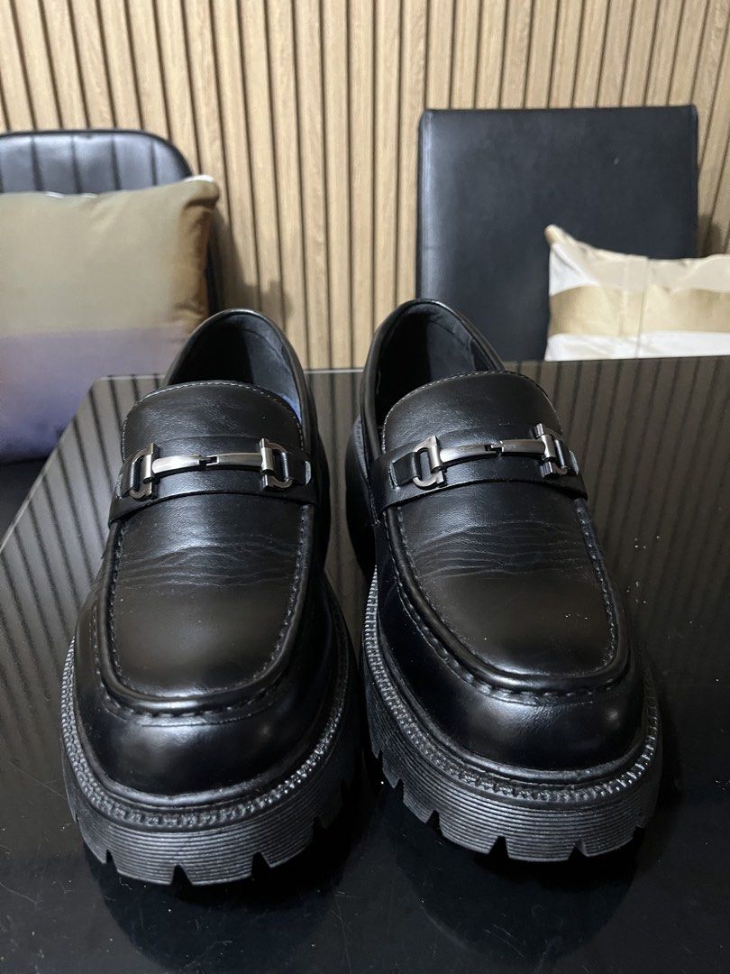 Black Chunky Sole Loafers with Silver Buckle (Category: Dress Shoes) located in Imus. Submitted by jappanergo (Listing ID 1452633589, Image 2). Description: - Classic black leather loafers - Chunky lug sole for a modern look - Elegant silver metal buckle detail - Easy slip-on style - Versatile: dress up or down Wore once for wedding.