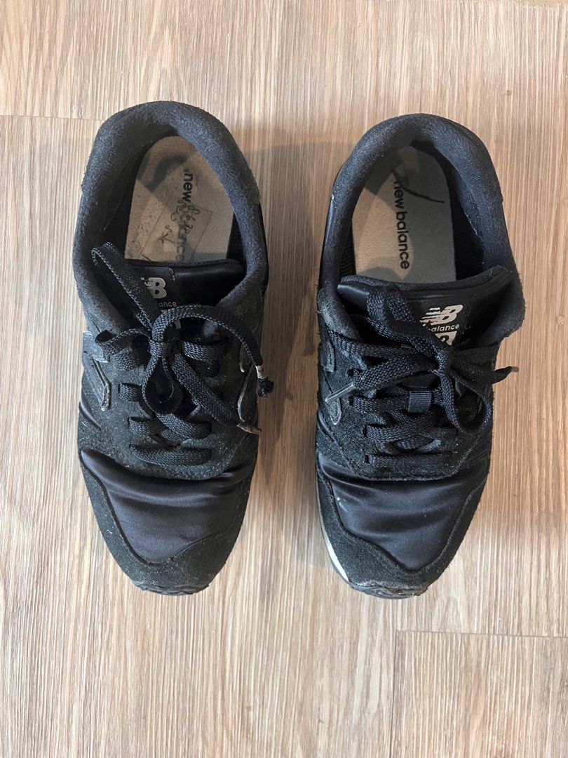 Black New Balance 373 Sneakers (Category: Sneakers) located in Quezon City. Submitted by aimeeob (Listing ID 1452588463, Image 1). Description: - Classic black New Balance 373 sneakers - Made with suede and satin materials - Features the iconic 'N' logo on the side - Perfect for everyday casual wear - Shows some signs of wear on soles and fabric, but still has plenty of life left - Grab these comfy kicks!.