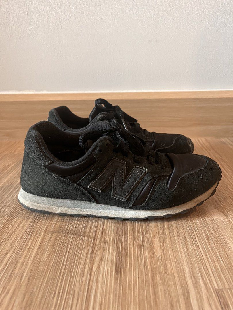 Black New Balance 373 Sneakers (Category: Sneakers) located in Quezon City. Submitted by aimeeob (Listing ID 1452588463, Image 2). Description: - Classic black New Balance 373 sneakers - Made with suede and satin materials - Features the iconic 'N' logo on the side - Perfect for everyday casual wear - Shows some signs of wear on soles and fabric, but still has plenty of life left - Grab these comfy kicks!.