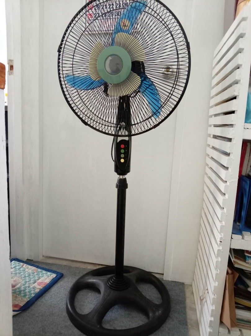 Black Stand Fan with Blue Blades (Category: Fans) located in Cavite. Submitted by ticketcode16 (Listing ID 1452608189, Image 1). Description: stand fan in good working condition rfs: decluttering.