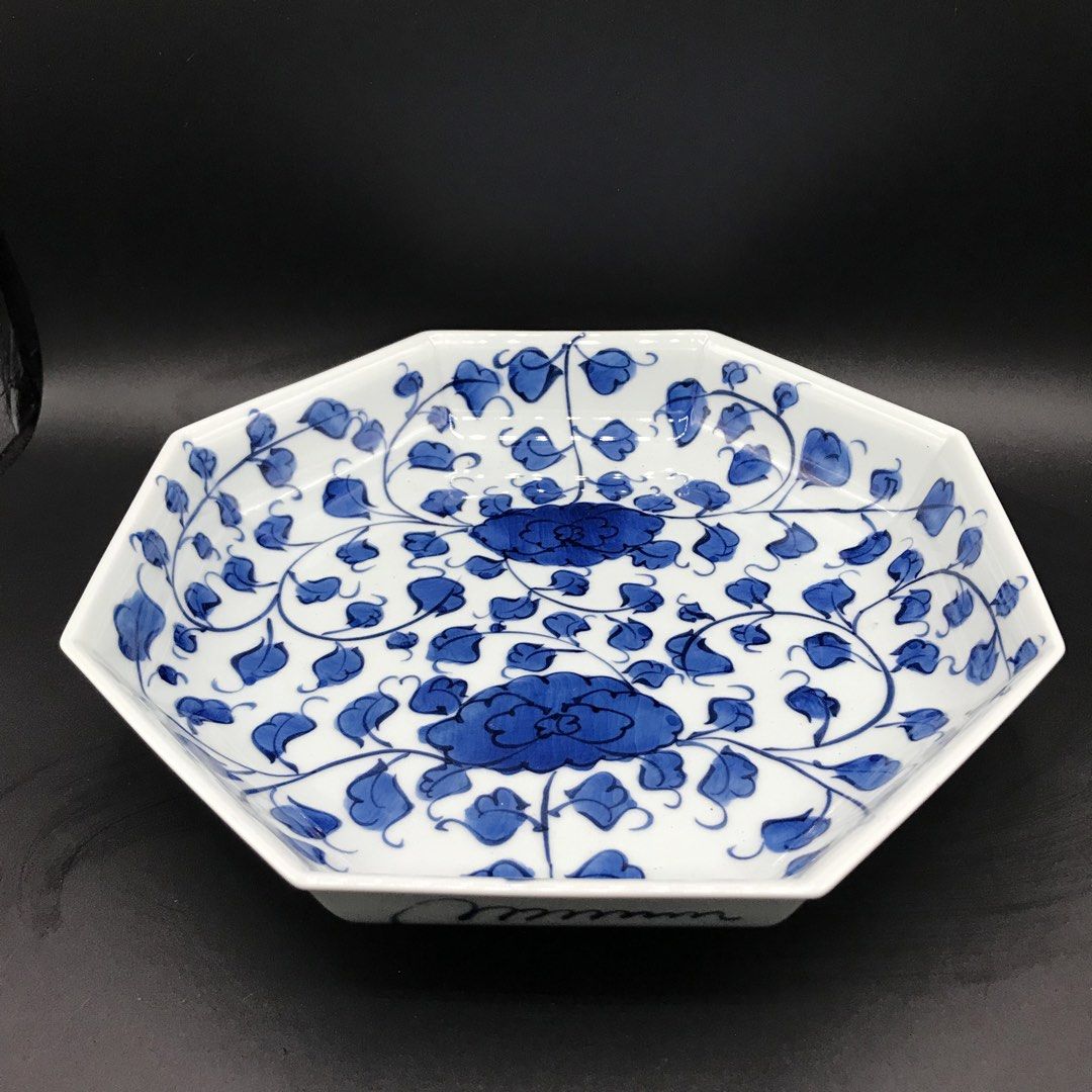 Blue and White Floral Octagonal Ceramic Serving Plate (Category: Dinnerware & Cutlery) located in Baao. Submitted by all.things.japan (Listing ID 1452619547, Image 1). Description: Dimensions: 9.0 (d) x 1.75 (h) inches Brand New - Octagonal serving plate - Classic blue and white floral vine pattern - Ideal for serving snacks or as a decorative piece.