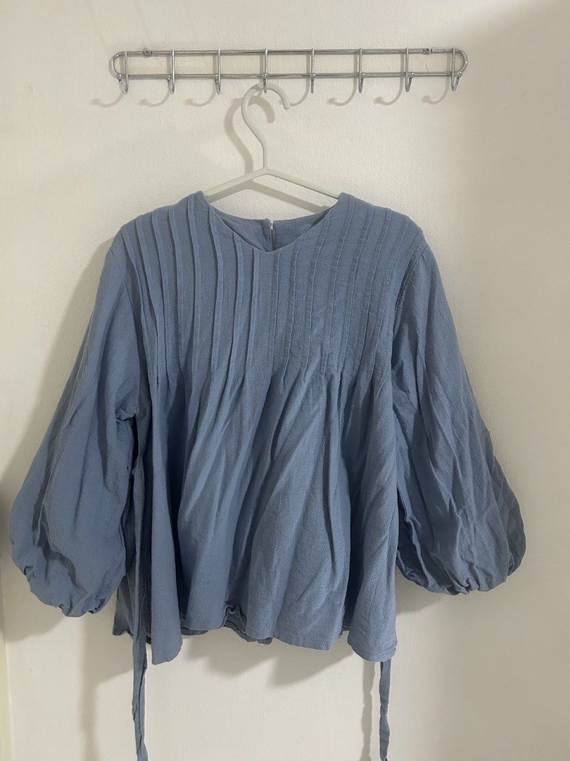 Blue Blouse (Category: Blouses) located in Singapore. Submitted by wahyni04 (Listing ID 1452646921, Image 1). Description: blue blouse free size used once attached strings to tie back puffy sleeves chat for measurements! .