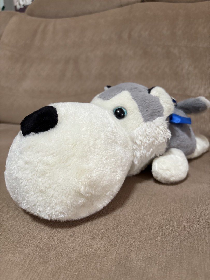 Blue Magic Husky Dog Plush Toy (Category: Plushies & Soft Toys) located in Cavite. Submitted by marissa0_0 (Listing ID 1452685901, Image 2). Description: - Adorable husky plush toy from Blue Magic. - Super soft and cuddly. - Features a cute blue ribbon around its neck. - Ideal gift for children or a must-have for collectors. - Clean and well-maintained, ready for its new owner..