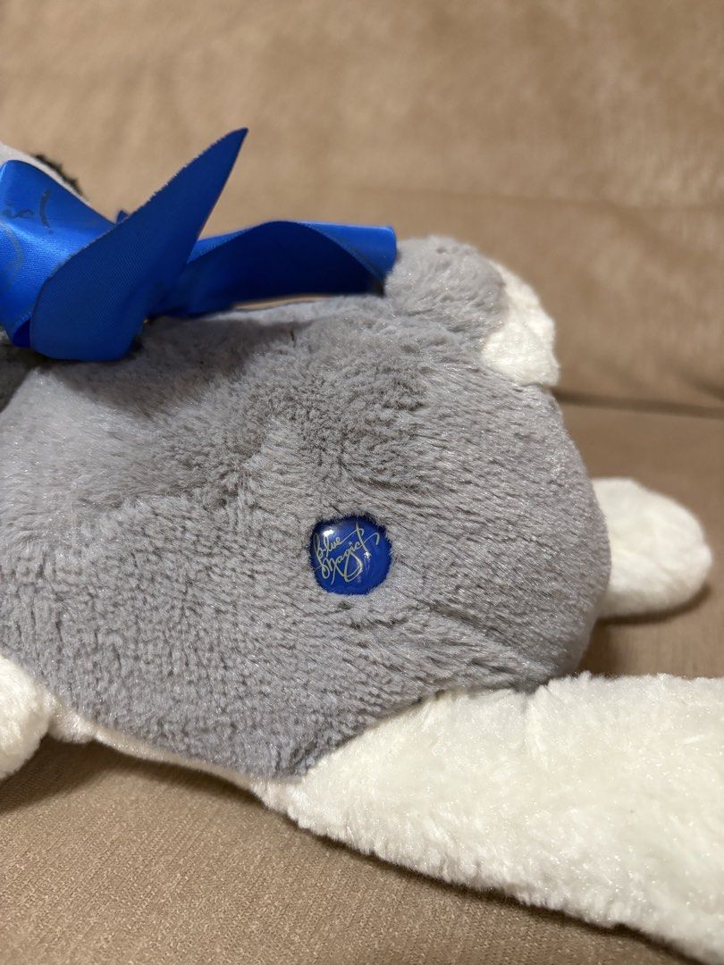 Blue Magic Husky Dog Plush Toy (Category: Plushies & Soft Toys) located in Cavite. Submitted by marissa0_0 (Listing ID 1452685901, Image 3). Description: - Adorable husky plush toy from Blue Magic. - Super soft and cuddly. - Features a cute blue ribbon around its neck. - Ideal gift for children or a must-have for collectors. - Clean and well-maintained, ready for its new owner..