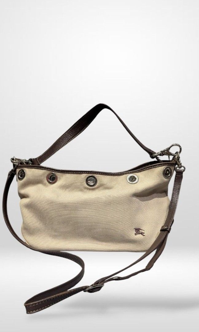 Burberry Blue label two way bag (Category: Cross-body Bags) located in Baguio. Submitted by second_handchic (Listing ID 1452575442, Image 3). Description: authentic burberry blue label two way bag In good condition silver hardware leather strap canvas material.
