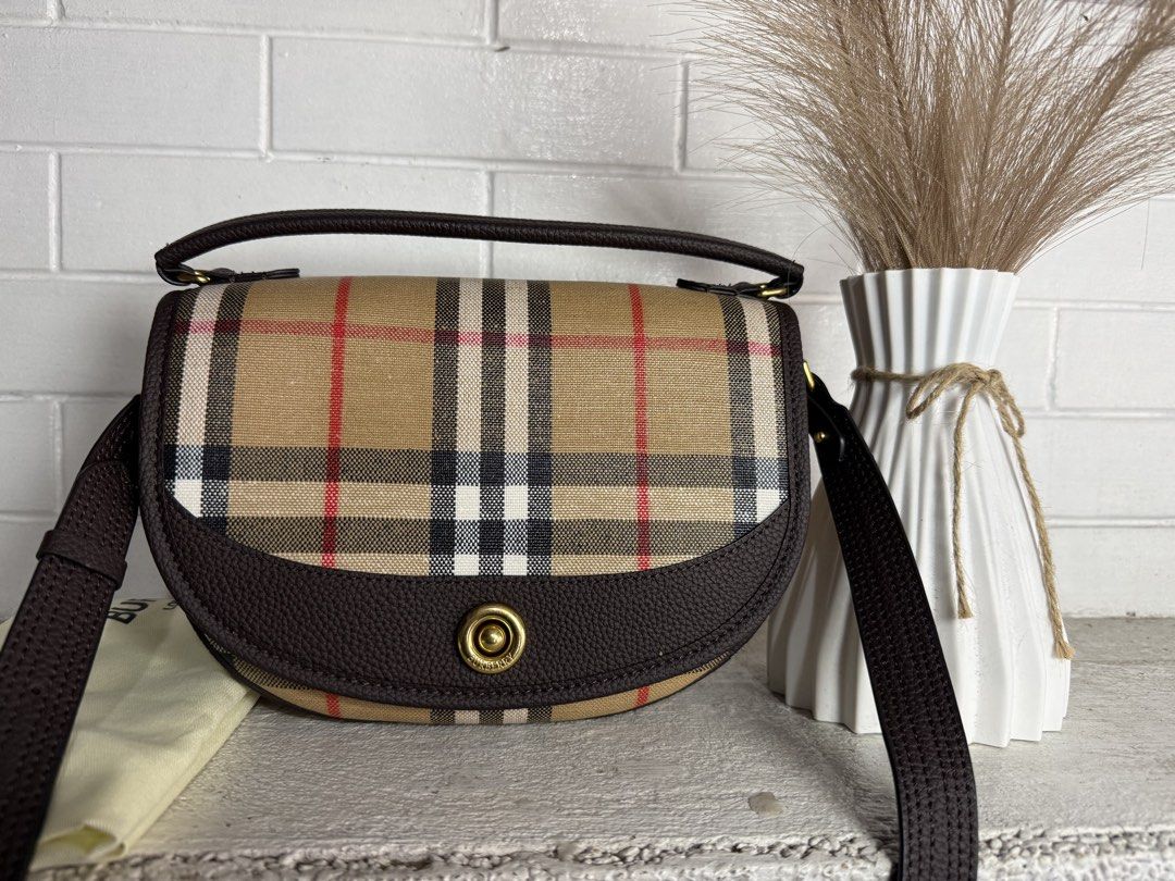 Burberry Half Moon Bag (Category: Luxury Bags & Wallets) located in Baguio. Submitted by danielg2 (Listing ID 1452524792, Image 1). Description: With dustbag Like new.