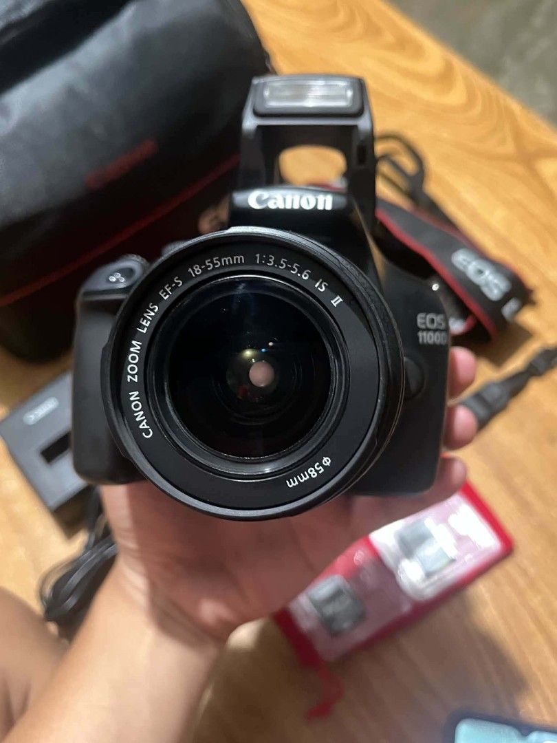 Canon EOS 1100D DSLR Camera with Lens and Accessories (Category: Cameras) located in San Fernando. Submitted by trndd3 (Listing ID 1452548166, Image 3). Description: - Canon EOS 1100D Camera Body - EF-S 18-55mm Lens - Canon Camera Bag - Charger - Canon Battery - 2 x Kingston SD Cards (128GB) - Camera Canon Neck Strap - Camera Canon Hand Strap - Ready to shoot! PHP 15,000 NEGOTIABLE FOR SURE BUYERS.