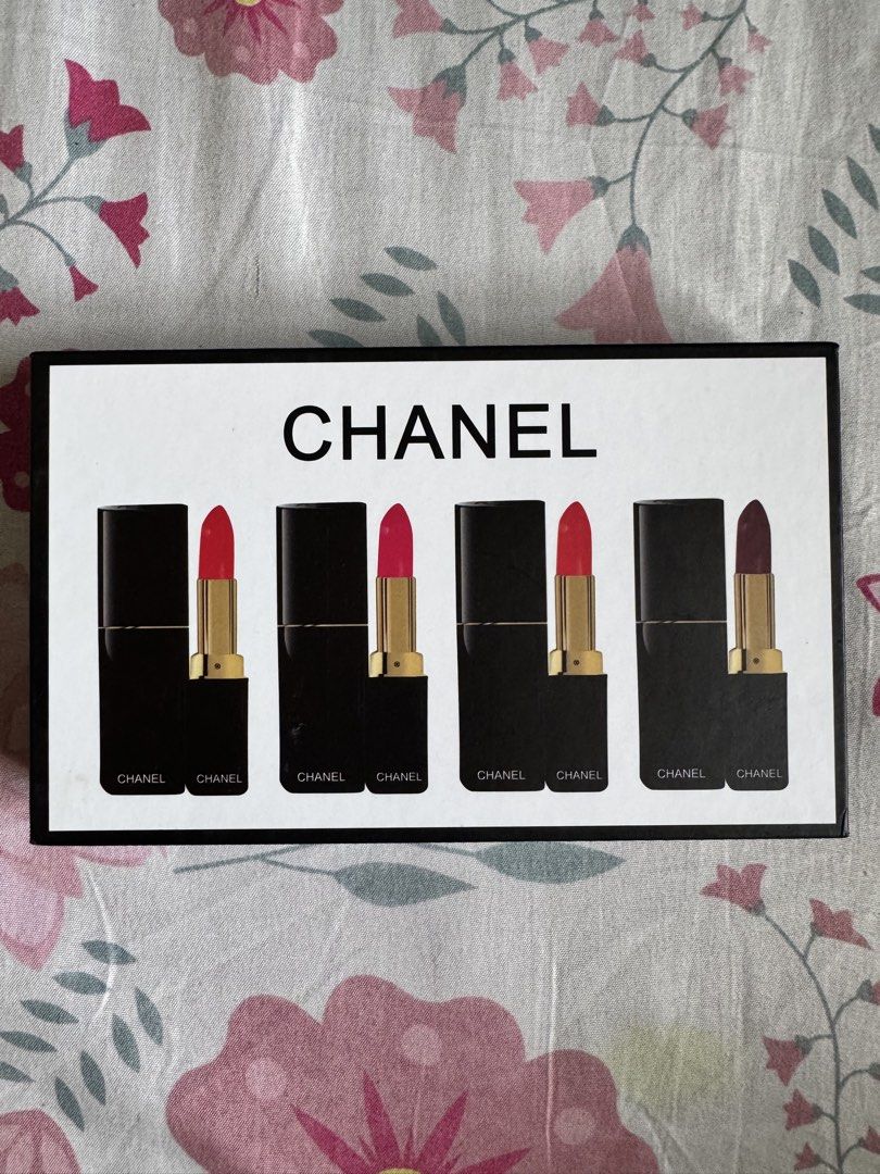 Chanel Rouge Allure Lipstick Set (Category: Makeup) located in San Miguel. Submitted by meseszy (Listing ID 1452525060, Image 3). Description: RFS: Nadoble napabili from Italy 🇮🇹 - Authentic Chanel lipstick gift set - Includes 4 stunning shades: red, bright pink, and deep berry - Luxurious black and gold packaging - Each lipstick features the iconic Chanel logo - Ideal for gifting or adding to your personal collection.