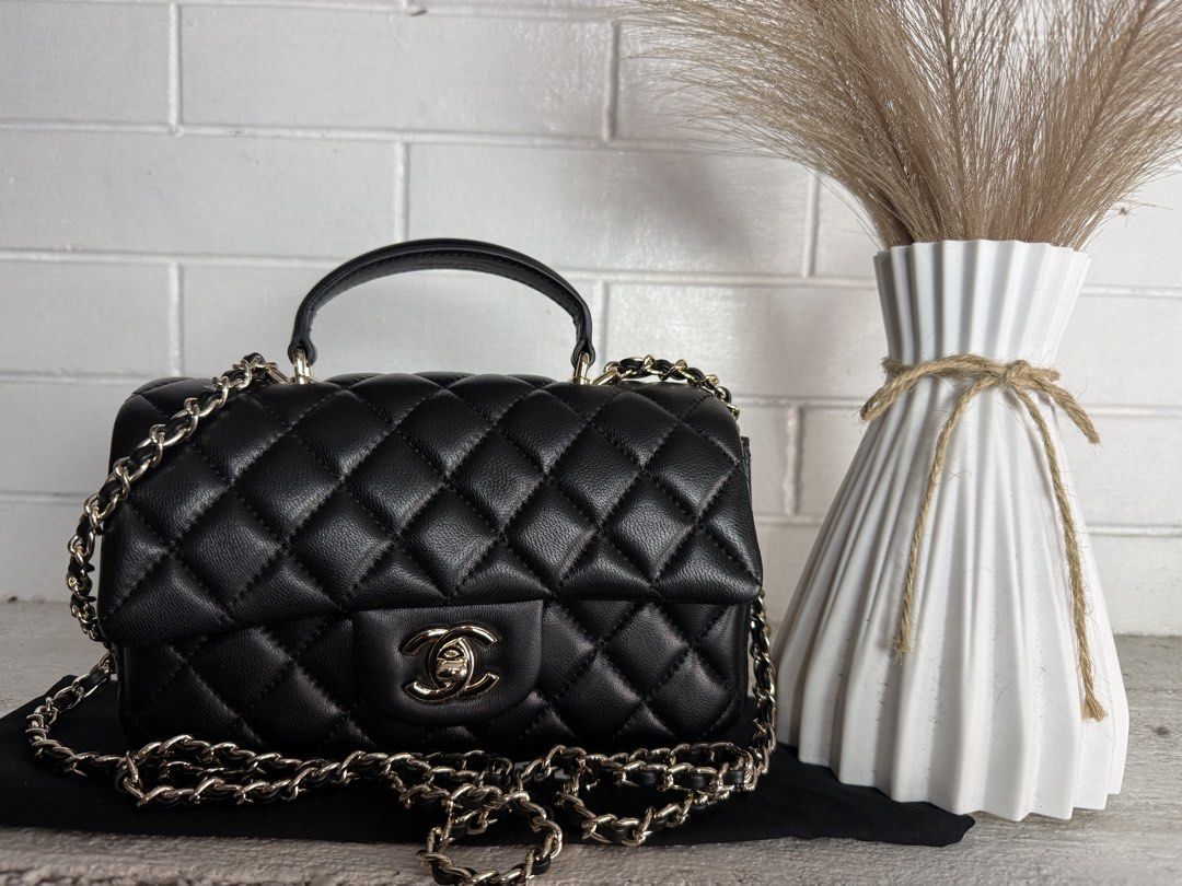 Chanel Top Handle (Category: Cross-body Bags) located in Baguio. Submitted by danielg2 (Listing ID 1452619440, Image 1). Description: With box dustbag Excellent like new Shw.