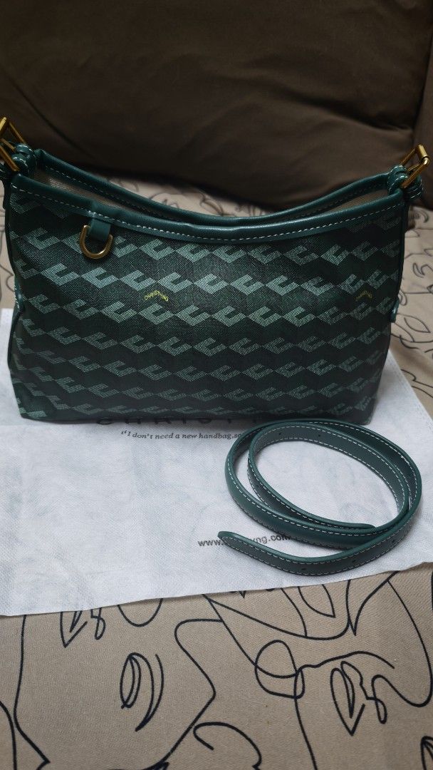 Christy Ng Nico Shoulder Bag (Category: Luxury Bags & Wallets) located in Manila. Submitted by luxe.allure (Listing ID 1452525049, Image 1). Description: - Christy Ng green monogram shoulder bag - Gold hardware details - Inside zip pocket - Magnetic snap closure - Detachable strap included - Dust bag included NotAuth, used once..