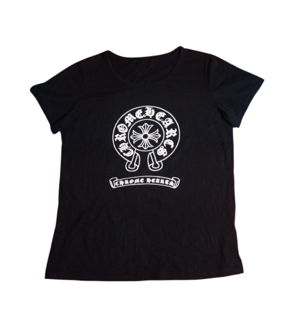 Chrome Hearts Black T-Shirt with Logo (Category: Tshirts & Polo Shirts ) located in Manila. Submitted by kents_thrift (Listing ID 1452687859, Image 1). Description: - Dimes: 20x25 - Cut Tags - Clasic black t-shirt - Features the iconic Chrome Hearts logo on the front - Circular logo with brand name and banner text - Simple and timeless design - Ideal for casual wear.