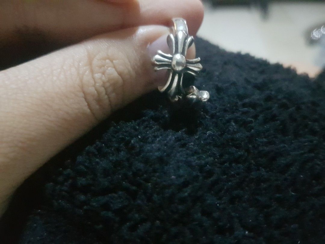 Chrome Hearts ring check details first (Category: Jewelry) located in Manila. Submitted by shakol. (Listing ID 1452616449, Image 2). Description: chrome hearts ring Antipolo loc not sure if real silver nor real chrome hearts off/legit size:9 or 10 no issue PM ME FOR PROOF OF TRANSACTION good condi bought it in vietnam.