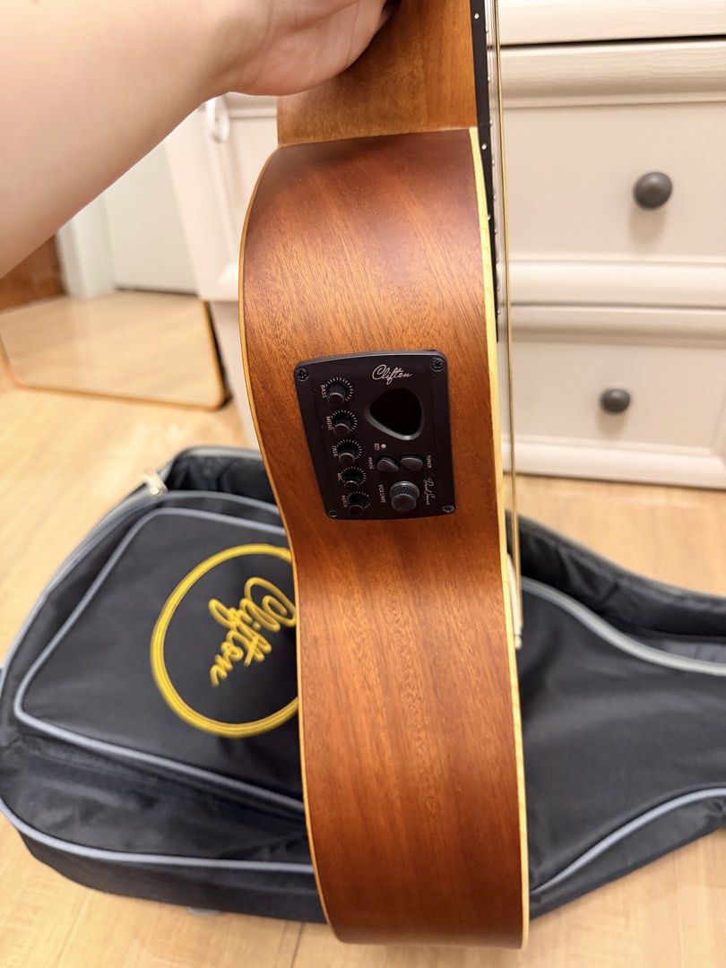 Clifton Top GS Mini w/ pick-up (Category: Musical Instruments) located in Cavite. Submitted by jamalinao (Listing ID 1452550313, Image 3). Description: - Comes with a black gig bag - Built-in electronics with control knobs on the side - Ideal for home playing or small gigs - Ready for a new owner -Bought for 7,900 -Used only to practice for 1 week(impulse buy) Specs: Body: 36” GS mini Top: Solid Sitka Spruce Back&Side: Laminated Sapele Fingerboar
