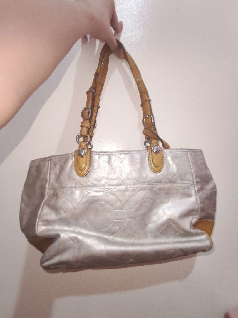 Coach Mia Embossed Leather Tote (Category: Luxury Bags & Wallets) located in Manila. Submitted by kari.pink (Listing ID 1452642062, Image 3). Description: preloved embossed coach mia! spot repainted some stains. Very pretty metallic coat! Favorite tote bag. Pm for vid!.