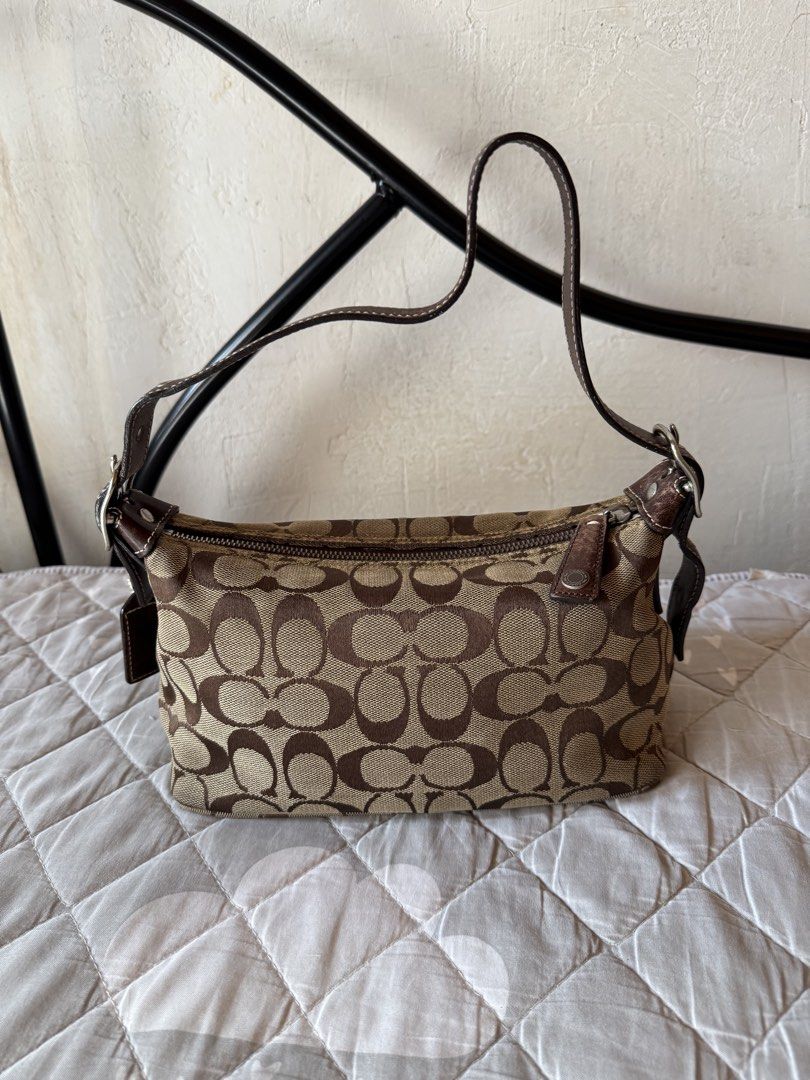 Coach Monogram vintage Brown (Category: Luxury Bags & Wallets) located in Danao, Cebu. Submitted by jojie.1983 (Listing ID 1452508929, Image 1). Description: original/authentic preloved vintage coach baguette small size adjustable strap no flaws expect minor sign of use only .