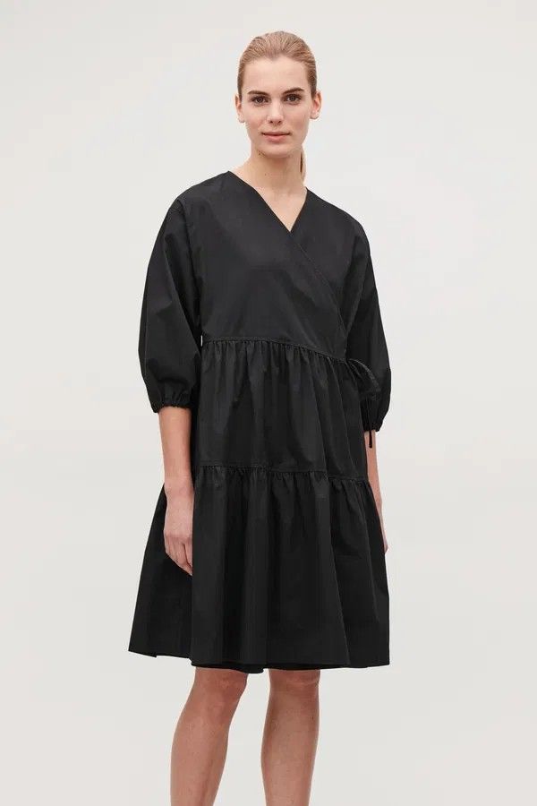 COS navy Tiered Midi Wrap Dress (Category: Dresses) located in Davao. Submitted by parenasnic86577 (Listing ID 1452609813, Image 1). Description: - navy midi dress - Tiered skirt - V-neckline - Wrap front with tie closure - Puff sleeves with elasticated cuffs - Made from crisp cotton poplin - Versatile for dressing up or down.
