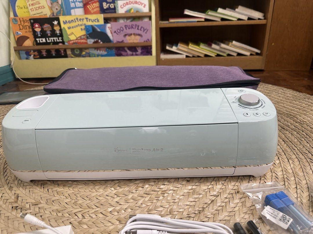Cricut Explore Air 2 Mint Machine with Accessories (Category: Craft Supplies & Tools) located in Manila. Submitted by godinezcri59613 (Listing ID 1452518386, Image 1). Description: - Mint Green Cricut Explore Air 2 Machine - Power Cords - Purple Carrying Bag - Cutting Mats - Weeding Tools - Scraper - Scissors - Pens - Assorted Rolls of Vinyl (including glitter and gold finishes) - Great bundle for crafting projects.