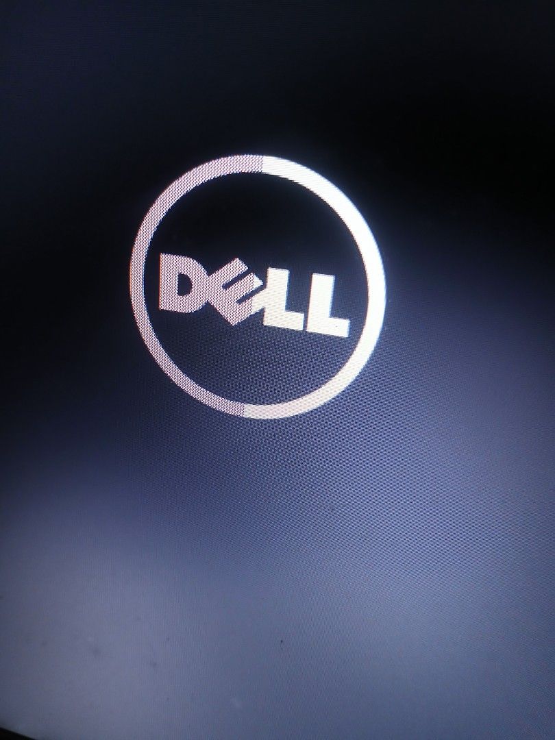 Dell Laptop with Charger - Battery Failure (Category: Chargers) located in Angono. Submitted by pdmiranda14 (Listing ID 1452652334, Image 3). Description: - Dell laptop for sale - Boots up to Windows login screen - Screen displays 'permanent battery failure' message (battery needs replacement) - Dell logo visible during startup - Original Dell power adapter included - Sold as is.