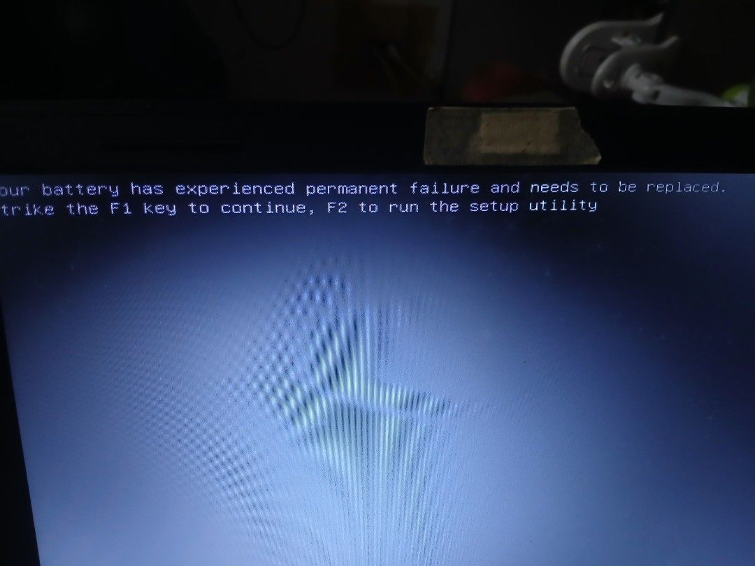 Dell Laptop with Charger - Battery Failure (Category: Chargers) located in Angono. Submitted by pdmiranda14 (Listing ID 1452652334, Image 2). Description: - Dell laptop for sale - Boots up to Windows login screen - Screen displays 'permanent battery failure' message (battery needs replacement) - Dell logo visible during startup - Original Dell power adapter included - Sold as is.