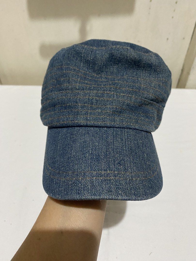 Denim Cap with Adjustable Strap (Category: Caps & Hats) located in Manila. Submitted by resi.diaz (Listing ID 1452593633, Image 2). Description: - some rust stain at the adjustable band. - Cool denim cap - Classic shape with curved brim - Adjustable strap at the back with striped detail - Ideal for casual wear - Versatile accessory, pairs easily with any outfit.
