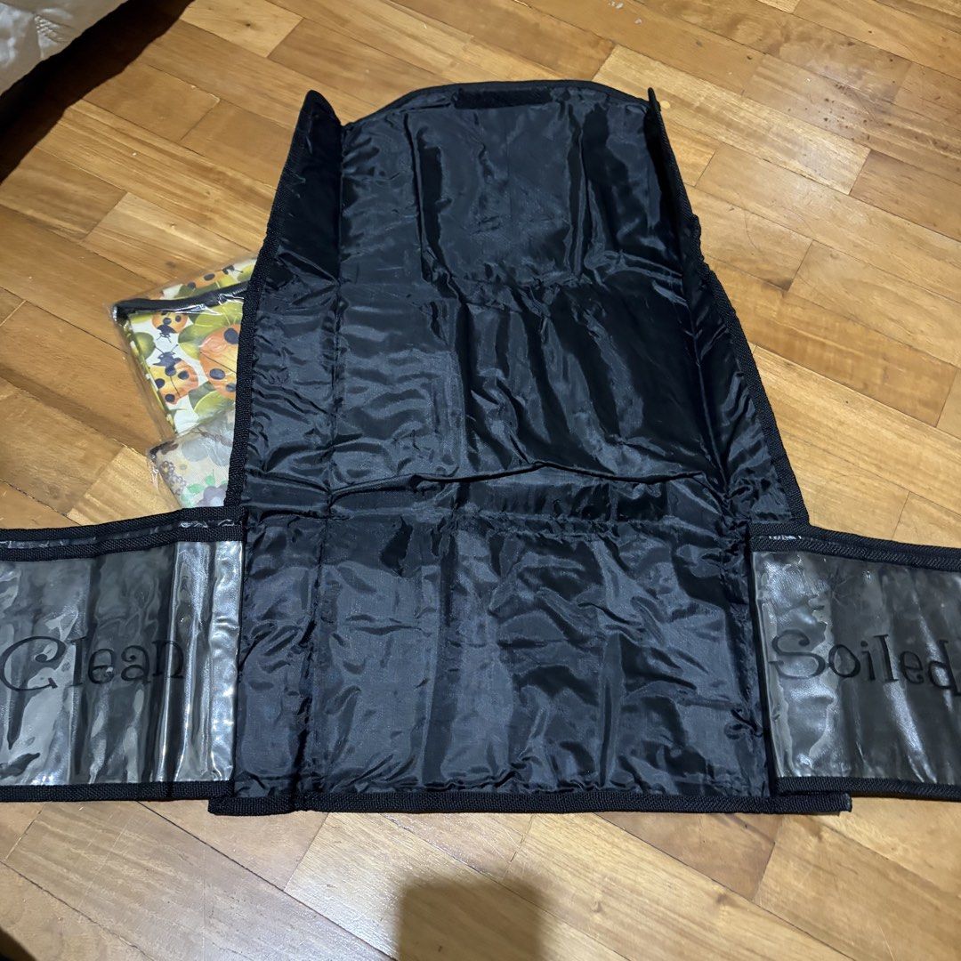 Diaper changing mat waterproof with compartment for diapers (Category: Changing Mats & Accessories) located in Manila. Submitted by chandleria (Listing ID 1452581069, Image 2). Description: These are brandnew but old stocks due to storage 200 each or take all 3pcs at 500 only waterproof material.