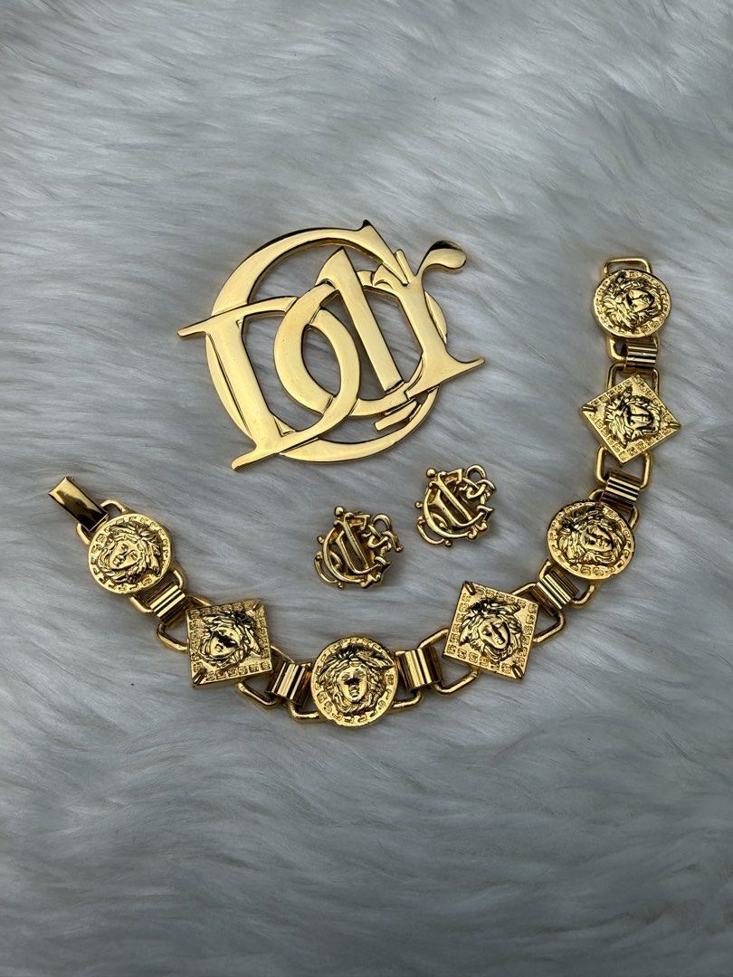 Dior & Versace vintage accessories (Category: Luxury Accessories) located in Paranaque City. Submitted by hellowooorld (Listing ID 1452690974, Image 1). Description: In very good condition. 1. Dior brooch - Php 6900 2. Dior earrings - Php 7,000 3. Versace bracelet - Php 15,900 Location: Parañaque MOP: BPI or Gcash MOD: Lalamove, Grab or J&T.