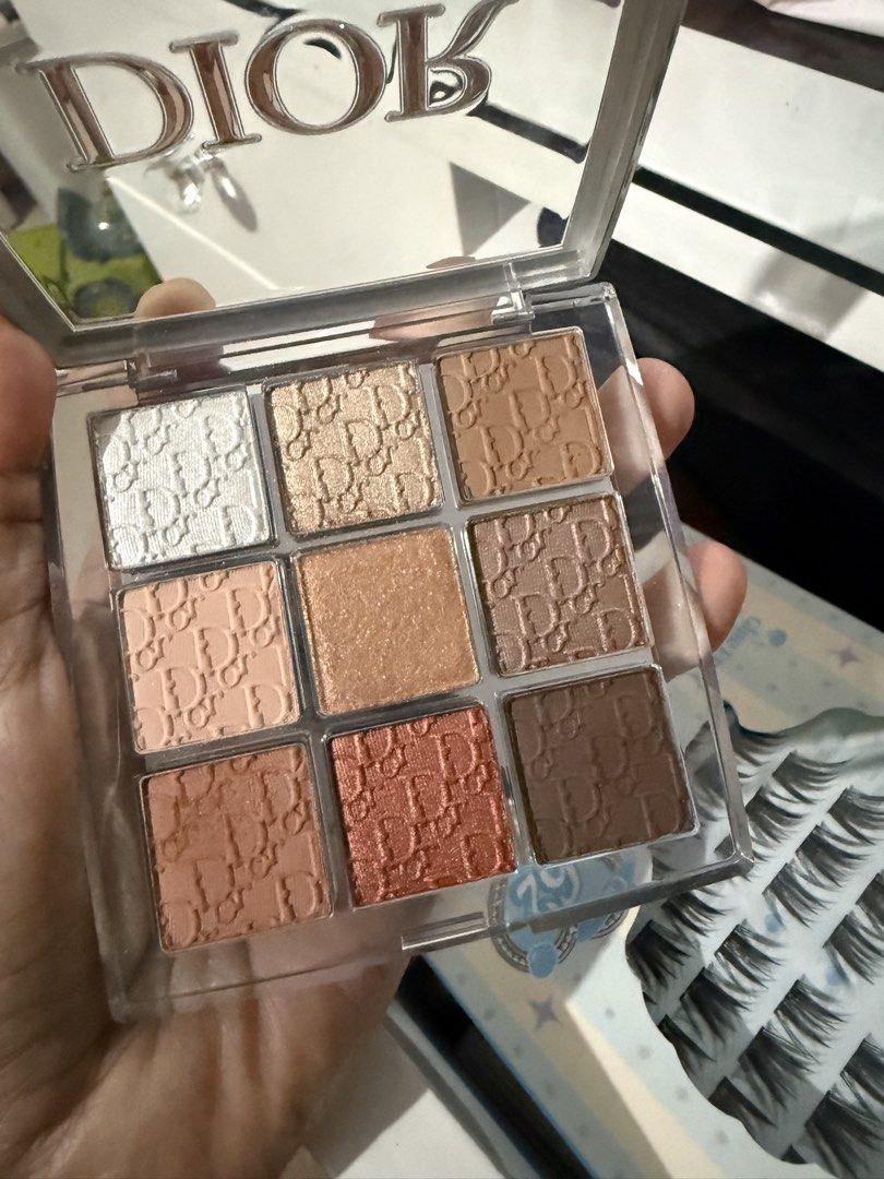 Dior Backstage Eye Palette 001 Nude Essentials (Category: Makeup) located in Manila. Submitted by aneajmik (Listing ID 1452559263, Image 3). Description: - Dior Backstage Eye Palette in shade 001 Nude Essentials. - Features 9 beautiful eyeshadow shades. - Includes a mix of matte, shimmer, and satin finishes. - Shades: pearly white, light gold, warm taupe, beige, rose bronze, shimmer brown, matte ochre, red copper, and matte brown. - Perfect for c