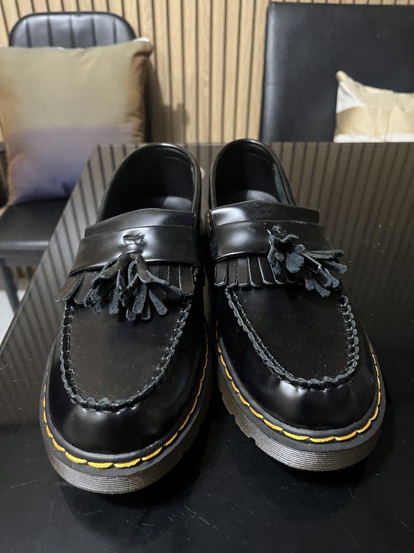 Dr. Martens Black Leather Tassel Loafers (Category: Dress Shoes) located in Imus. Submitted by jappanergo (Listing ID 1452634618, Image 1). Description: Classic Dr. Martens tassel loafers - Black leather - Signature yellow stitching detail on the sole - Never worn because I bought another shoe - Bought in Shoppee.
