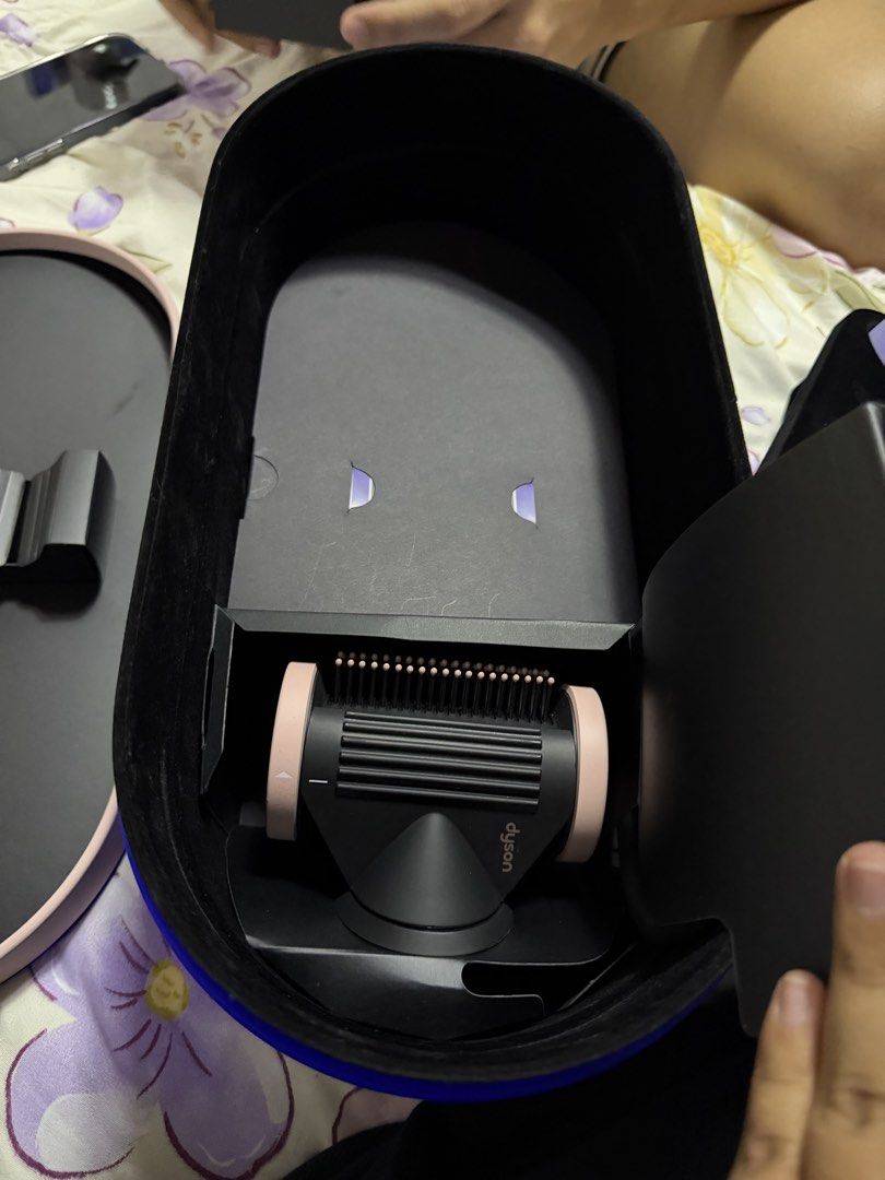 Dyson Supersonic Hair Dryer with Case (Category: Hair) located in Manila. Submitted by bookowl_ph (Listing ID 1452629898, Image 2). Description: -Brand new, never been used - Genuine Dyson Supersonic hair dryer in a beautiful blue color. - Includes original storage case (blue with pink trim) for neat organization. - Comes with all original attachments for versatile styling. - Perfect for achieving salon-quality hairstyles at home. Location: Subic