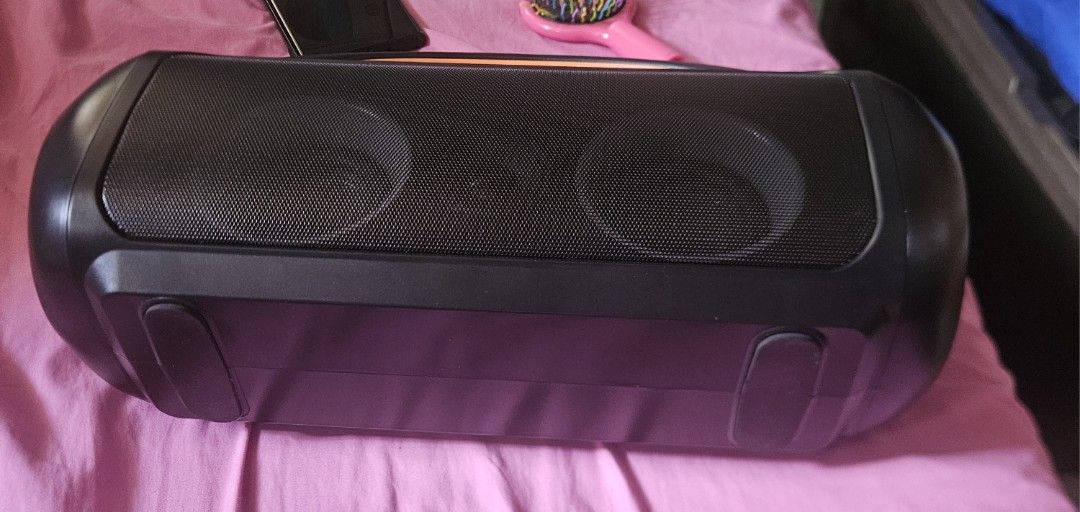 Earfun Portable Bluetooth Speaker (Category: Soundbars, Speakers & Amplifiers) located in Rodriguez. Submitted by Branded100 (Listing ID 1452624066, Image 2). Description: - Portable speaker with a convenient handle - Stylish orange accents - Easy-to-use buttons on top for controls - Dual speaker grilles on the front for clear sound - Durable rubber feet for stability - Ideal for enjoying music on the go j&t po avail na courier, you can book or i