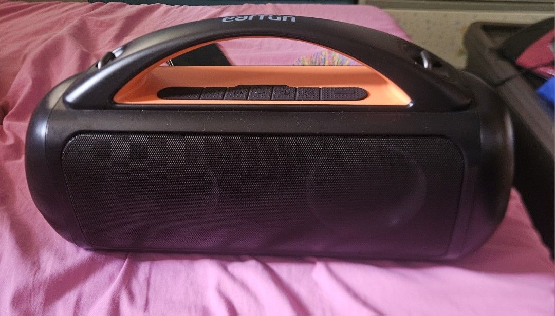 Earfun Portable Bluetooth Speaker (Category: Soundbars, Speakers & Amplifiers) located in Rodriguez. Submitted by Branded100 (Listing ID 1452624066, Image 1). Description: - Portable speaker with a convenient handle - Stylish orange accents - Easy-to-use buttons on top for controls - Dual speaker grilles on the front for clear sound - Durable rubber feet for stability - Ideal for enjoying music on the go j&t po avail na courier, you can book or i