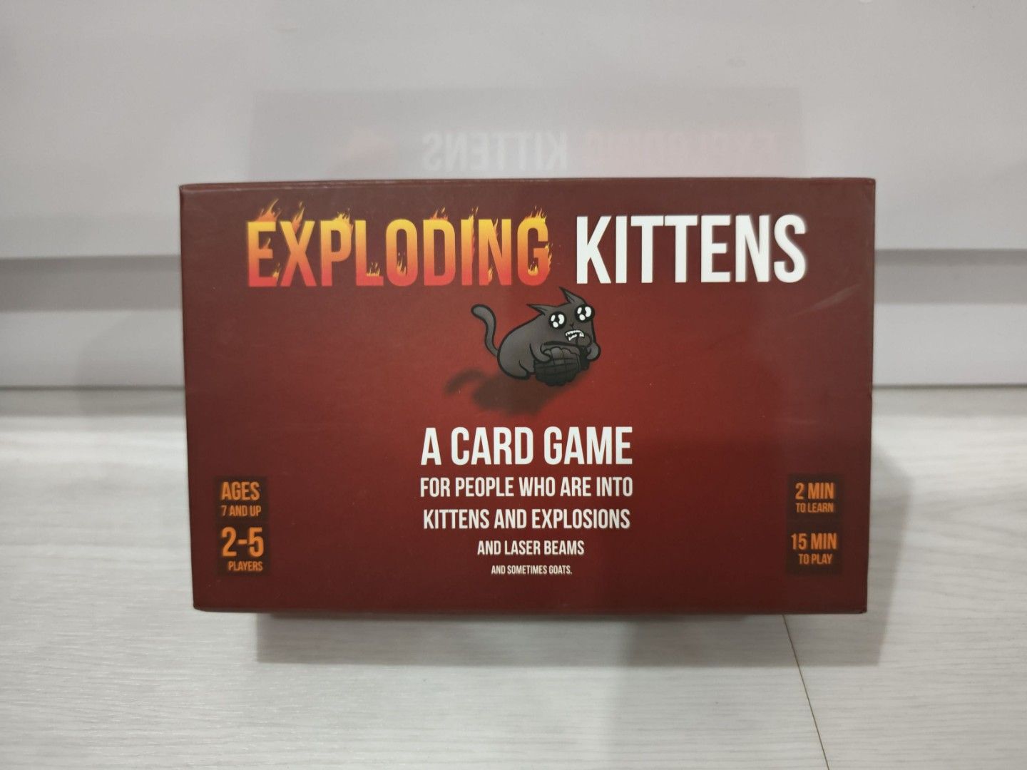 Exploding Kittens Card Game (Category: Board Games & Puzzles) located in Singapore. Submitted by mizmi (Listing ID 1452535986, Image 1). Description: Original launch edition. Brand new in box, card sealed and unopened. Clearing store. First come first served, self collect or Carousell SPX delivery paid by buyer. - Exploding Kittens: The card game of kitty-powered Russian Roulette! - Strategic gameplay: Draw cards, avoid the Exploding Kitten. - De